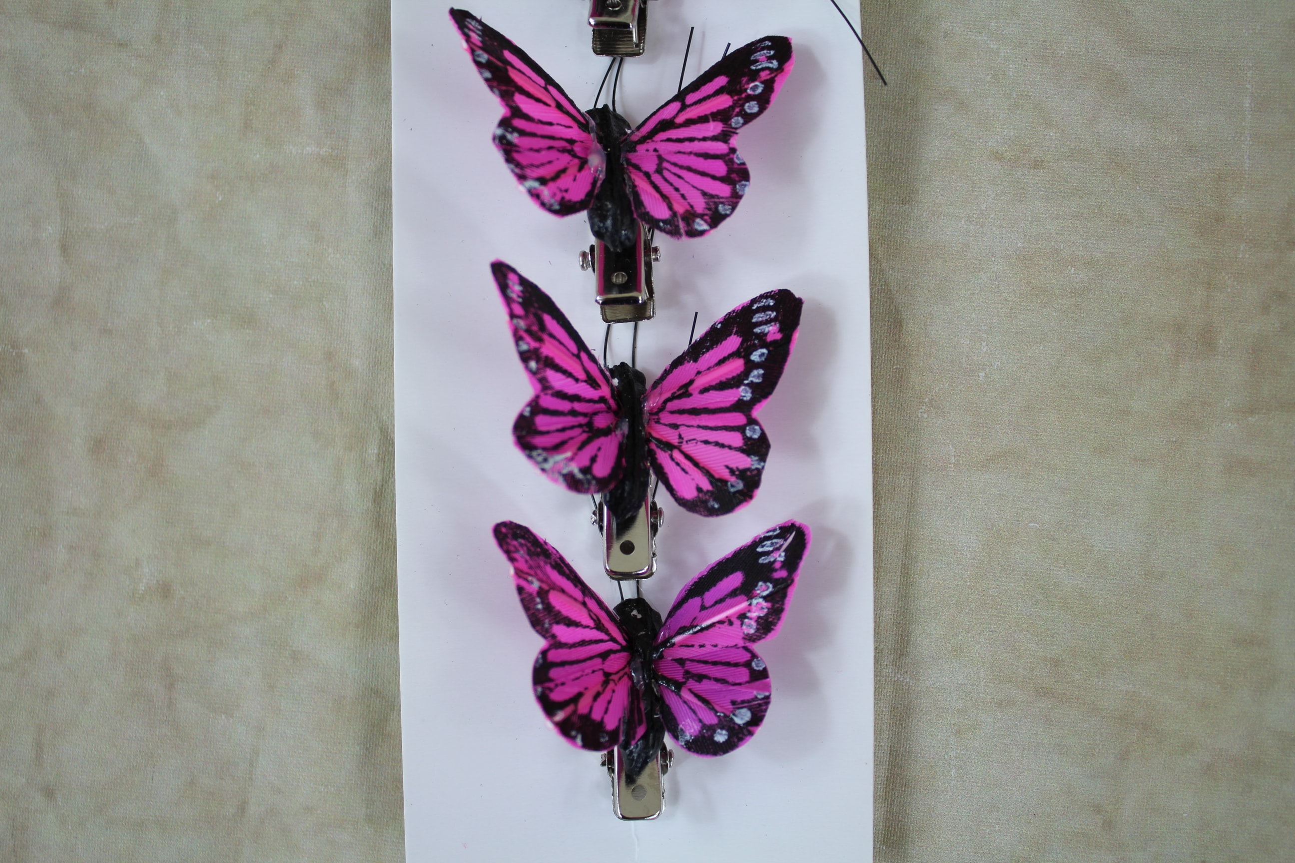 12 x 6 4cm feather butterflies on clips