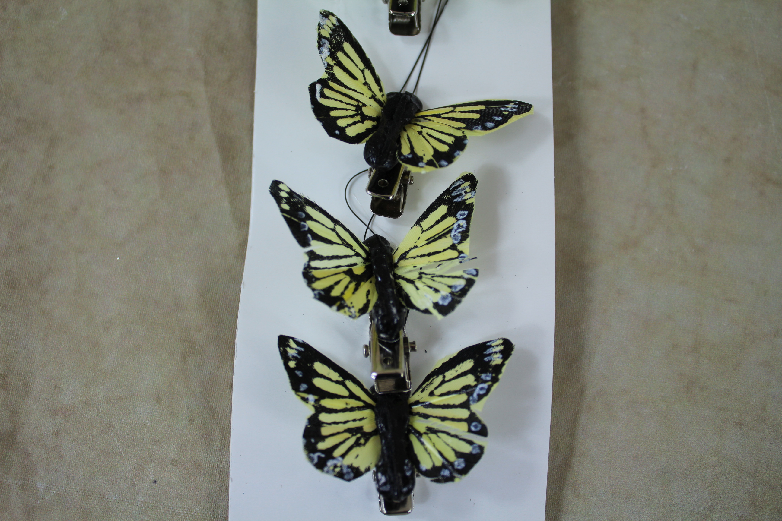 12 x 6 4cm feather butterflies on clips