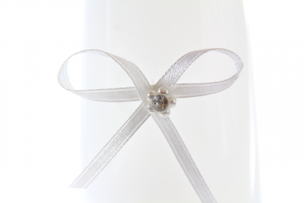 Pure white craft bow with diamonte center
